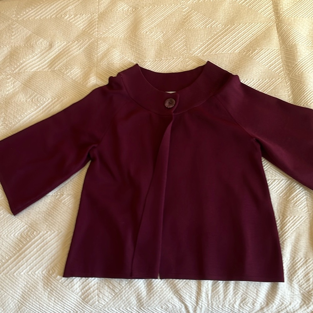 Burgundy cardigan/shrug. One-button three quarter sleeves